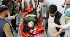 Bomb blasts kill dozens near school in Afghan capital