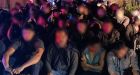 Texas border patrol agent faces human trafficking charges after 180 migrants found in stash houses