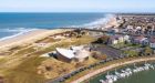 Canada agrees to help buy land near Juno Beach, ending condo dispute: sources