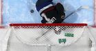 Oilers slide past Canucks