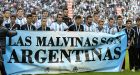 Argentina players pose before World Cup warm-up match with 'The Falklands are Argentine' banner