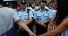 Hong Kong students face off with police clearing protest barricades