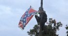Woman removes Confederate flag in front of South Carolina statehouse