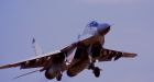 Russian jet 'shot down by Turkish forces after it flew into the country's airspace'