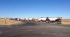 We want safety: Farmer combines, tractors line Alberta Highway 2 to protest Bill 6